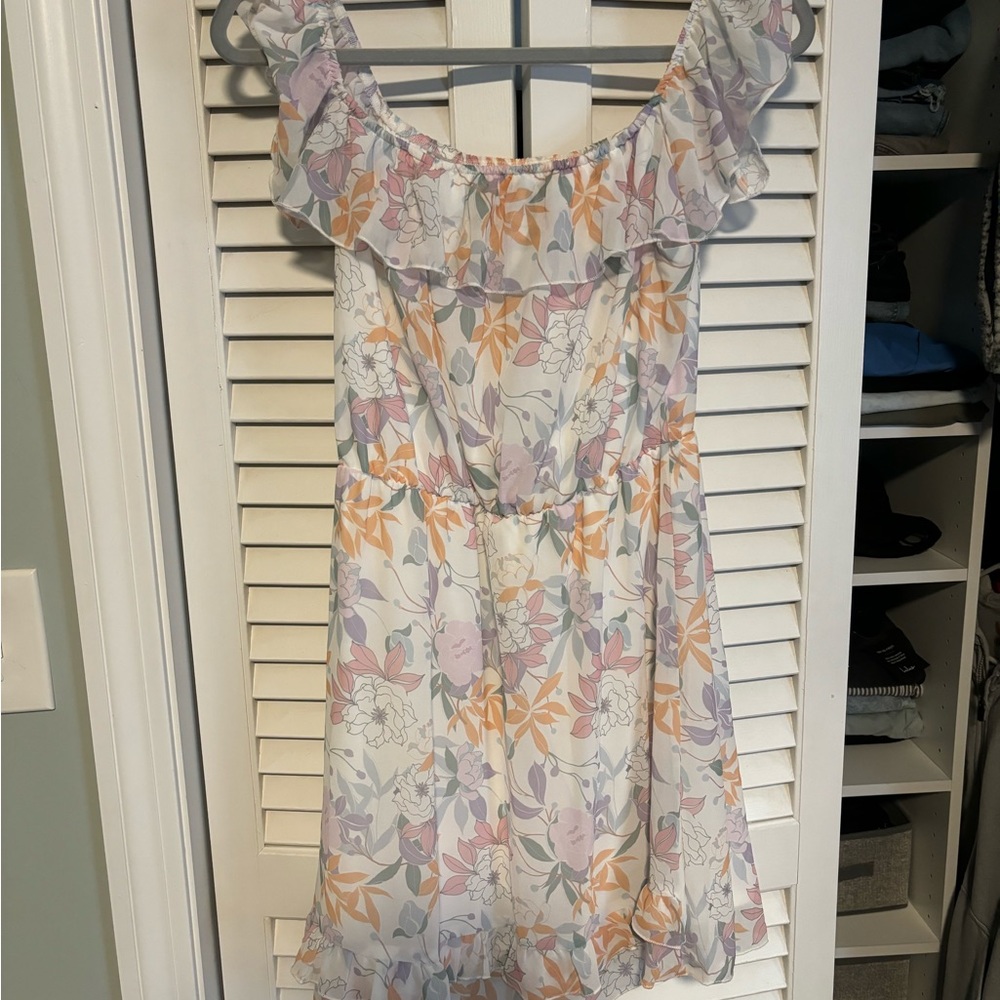 Mini dress from local boutique worn once, can be worn off shoulders